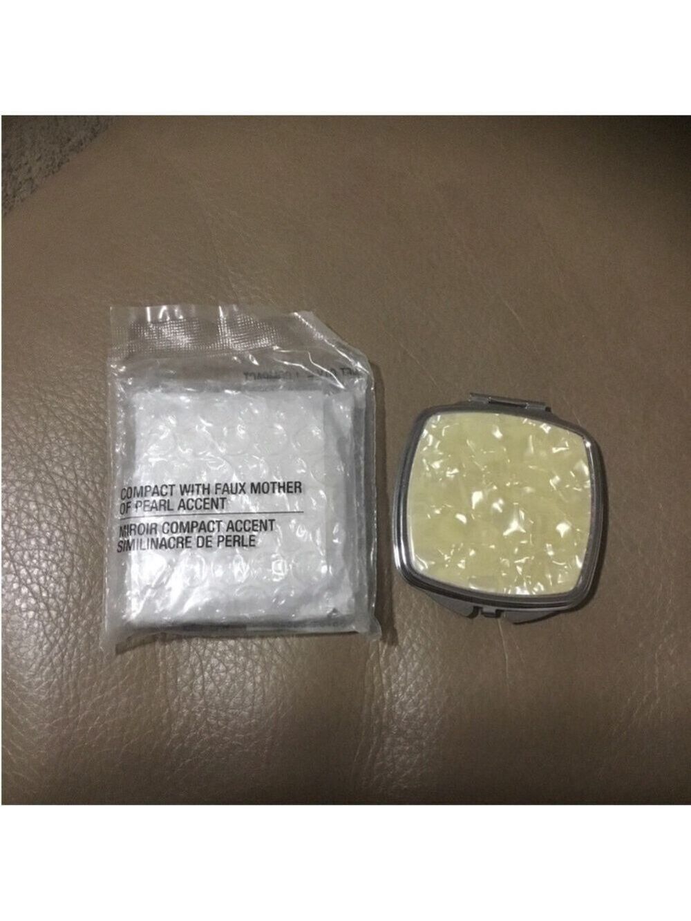 AVON compact wit faux mother of pearl accent set of 2 Both new never used